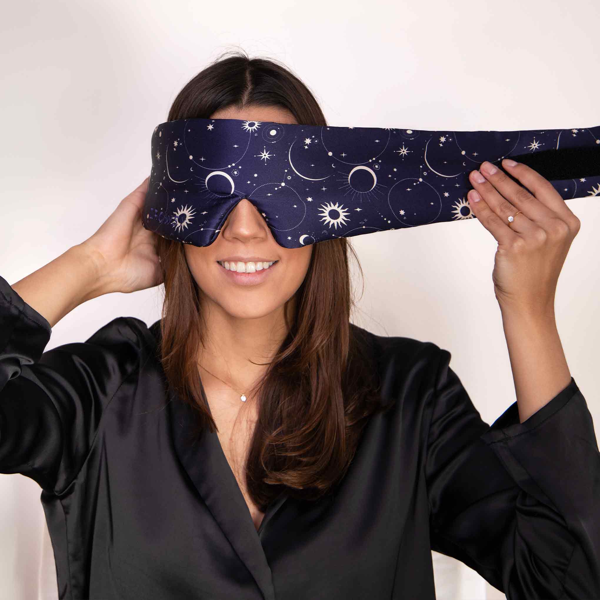 Drowsy-Sleep-Co.-Cosmic-Energy-Sleep-Mask-with-model2.jpg__PID:9718fc0b-f1e0-48b7-9c5b-55e374243362