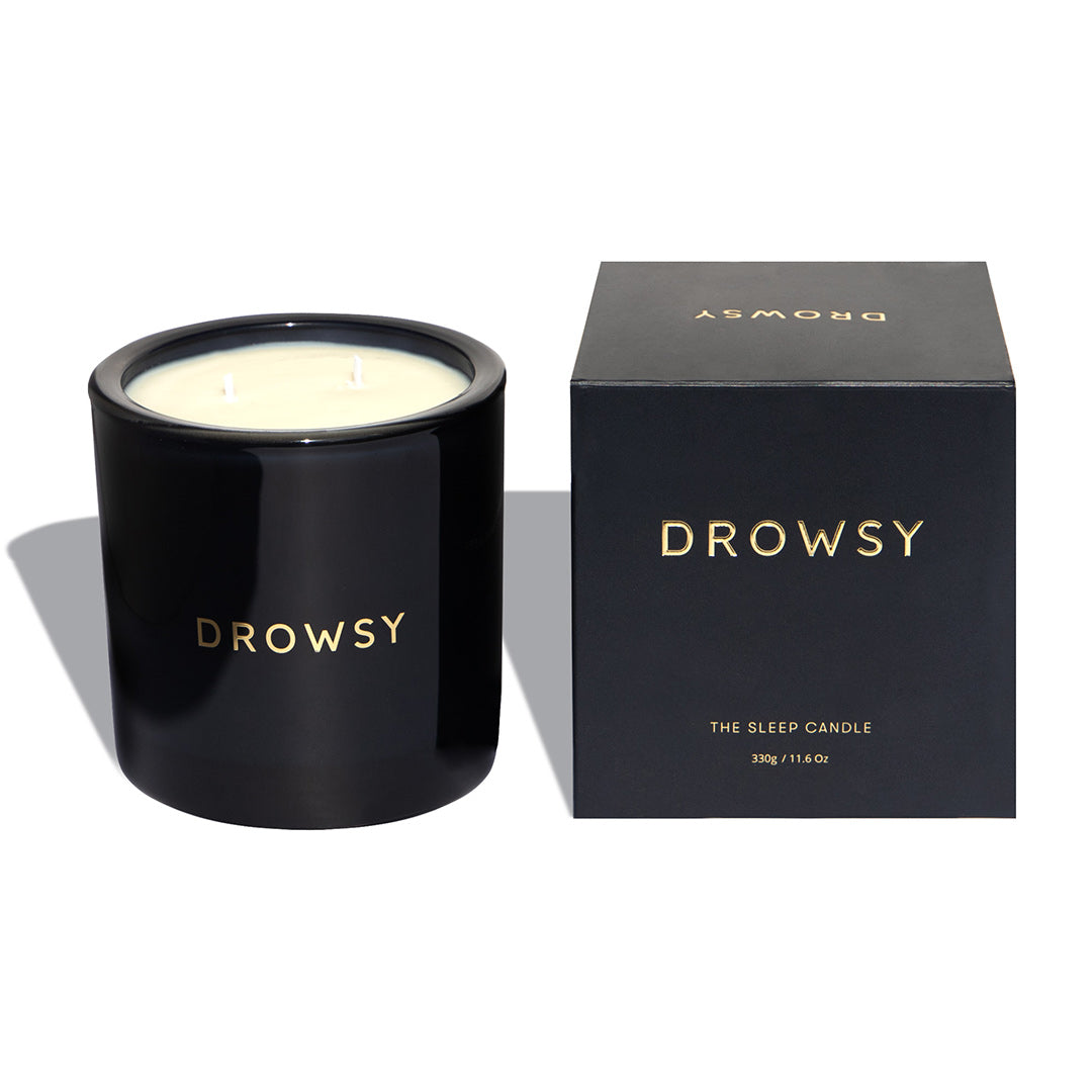 Drowsy-Sleep-Co.-Sleep-Candle-Blue-Glass-And-Box-On-White-Background.jpg__PID:ff97b047-d851-470f-b462-6590d9be32cc