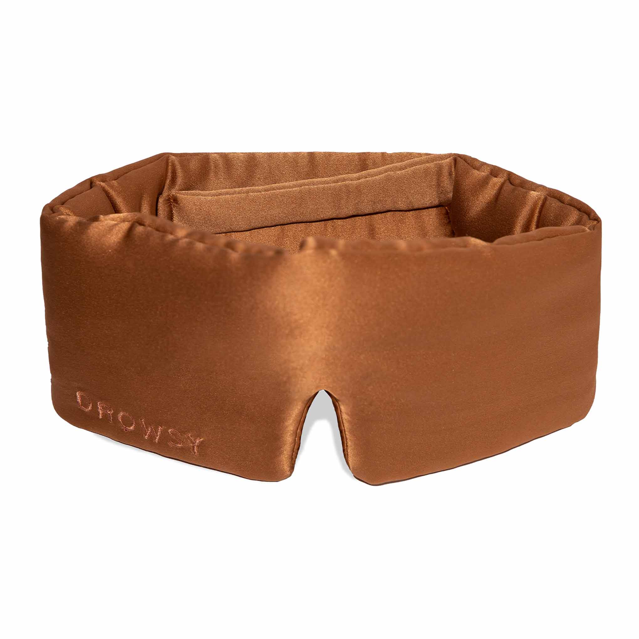 Burnt orange coloured Drowsy silk sleep mask on a white background